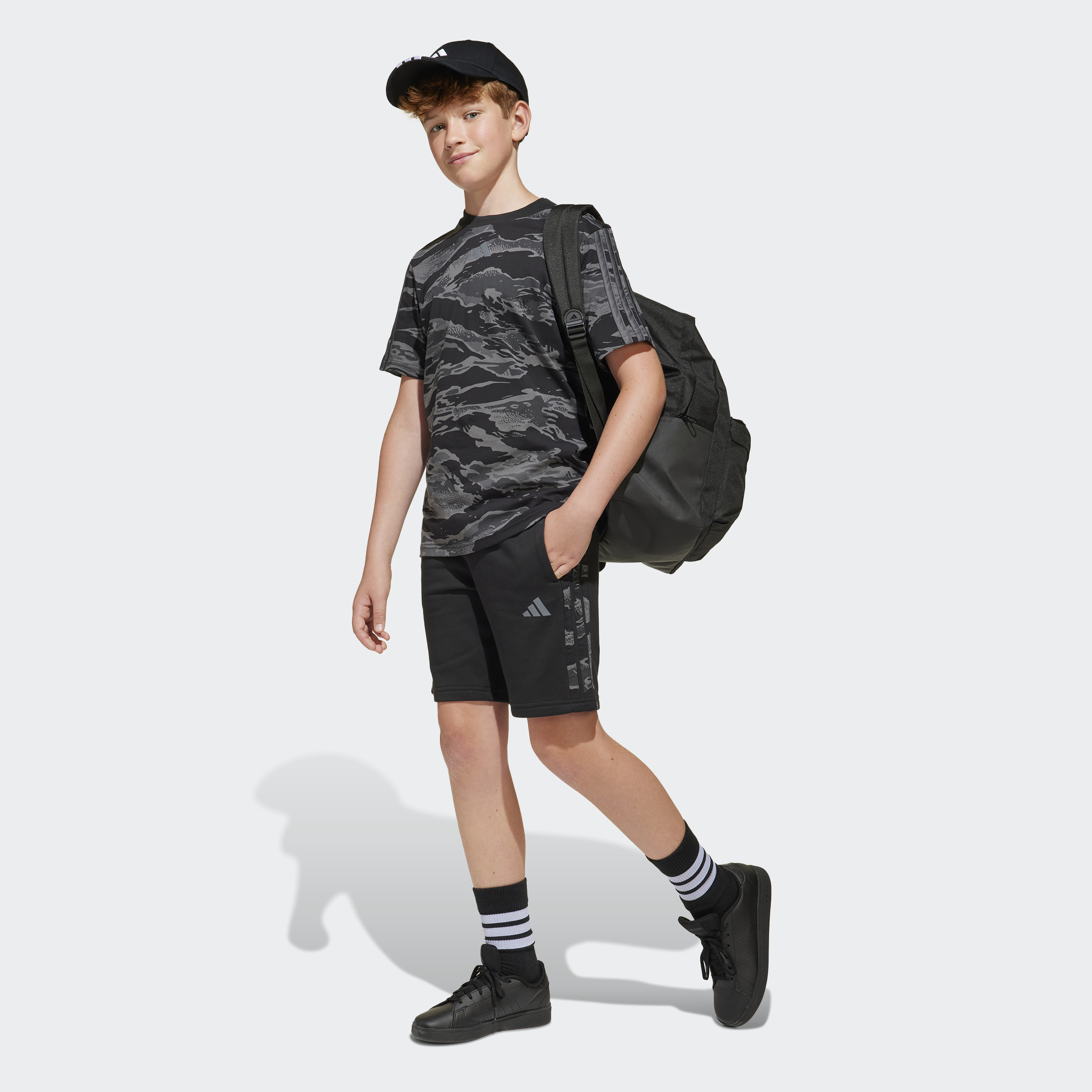 JC7498_5_APPAREL_On Model_Walking View_grey